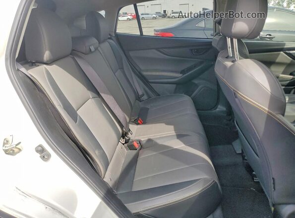 JF2GTHSC5NH266121 2022 SUBARU CROSSTREK White Vista interior trasera