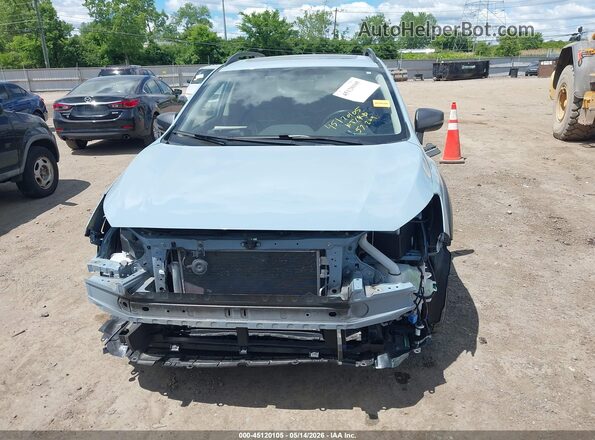 JF2GTHSC6NH207885 2022 SUBARU CROSSTREK Light Blue Vista interior trasera