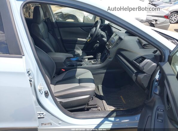 JF2GTHSC6NH207885 2022 SUBARU CROSSTREK Light Blue Vista interior delantera