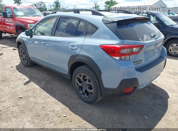 JF2GTHSC6NH207885 2022 SUBARU CROSSTREK Light Blue Trasero izquierdo
