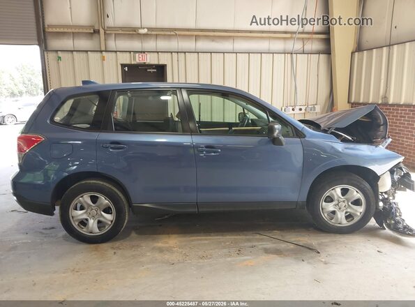 JF2SJAAC7JG606801 2018 SUBARU FORESTER Blue Вид задньої частини салону