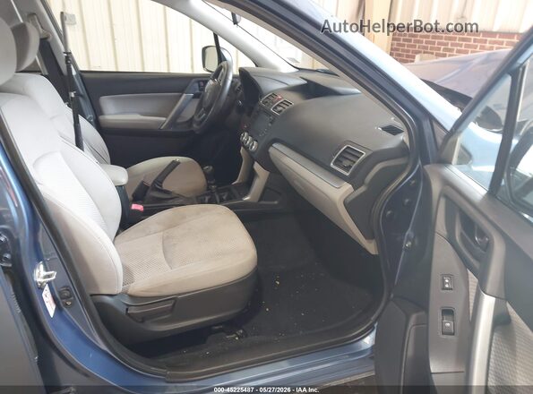 JF2SJAAC7JG606801 2018 SUBARU FORESTER Blue Вид салону спереду