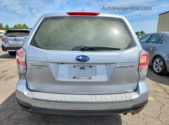 JF2SJAAC7JH453430 2018 SUBARU FORESTER Silver Widok z tyłu