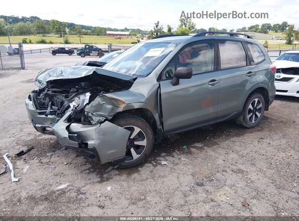 JF2SJABC1JH601750 2018 SUBARU FORESTER Green Front left