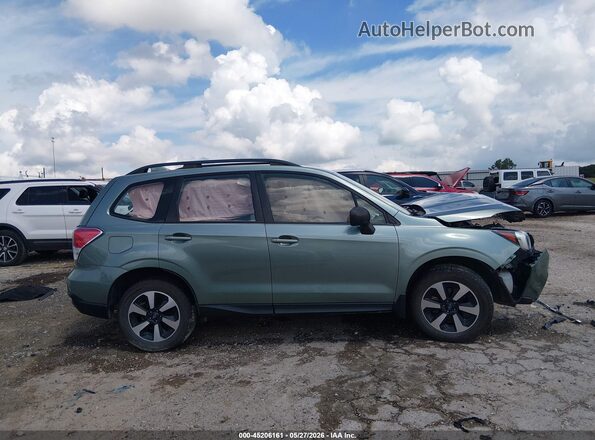 JF2SJABC1JH601750 2018 SUBARU FORESTER Green Rear interior view