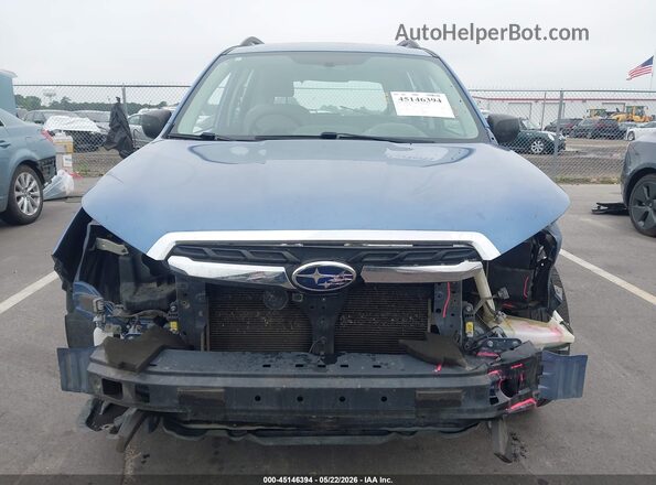 JF2SJABC2HH589604 2017 SUBARU FORESTER Blue Vista interior trasera