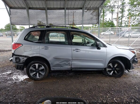 JF2SJABC5HH478058 2017 SUBARU FORESTER Light Blue Rear interior view