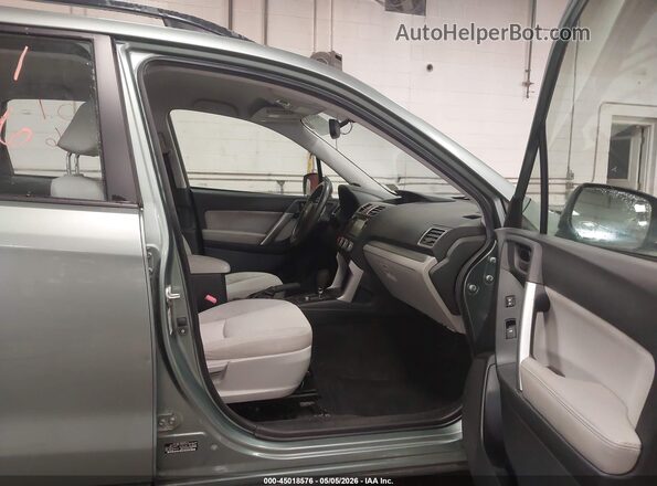 JF2SJABC7GH426736 2016 SUBARU FORESTER 2.5 Green Widok wnętrza z przodu