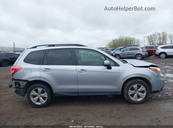JF2SJADC2GH538678 2016 SUBARU FORESTER Silver Vista interior trasera