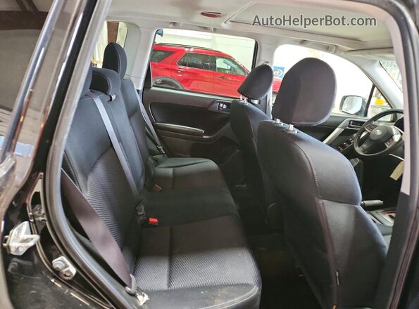 JF2SJADC4GH463126 2016 SUBARU FORESTER Charcoal Rear interior view