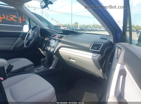 JF2SJADC4GH475342 2016 SUBARU FORESTER 2.5 Blue Front interior view