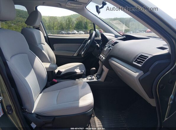 JF2SJAEC6HH810486 2017 SUBARU FORESTER Green Front interior view