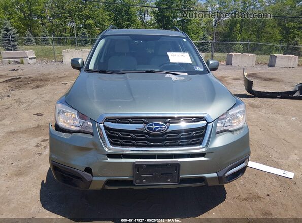 JF2SJAEC6HH810486 2017 SUBARU FORESTER Green Front view