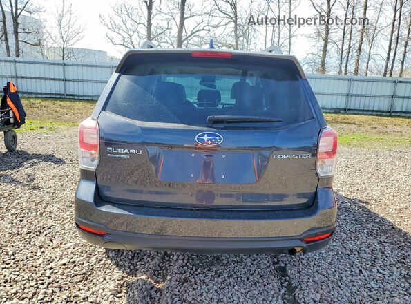JF2SJAEC7JH579328 2018 SUBARU FORESTER 2.5 Blue Rear view
