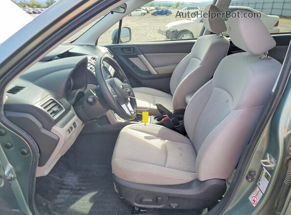 JF2SJAECXHG589660 2017 SUBARU FORESTER Зеленый Вид салона спереди