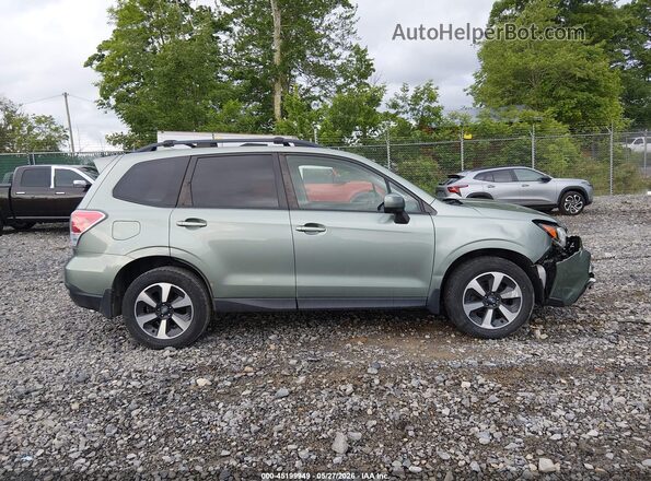 JF2SJAGC2HH568051 2017 SUBARU FORESTER Green Vista interior trasera