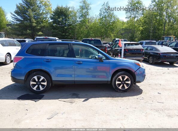 JF2SJAGC4JH464747 2018 SUBARU FORESTER Blue Սալոնի հետևի տեսք