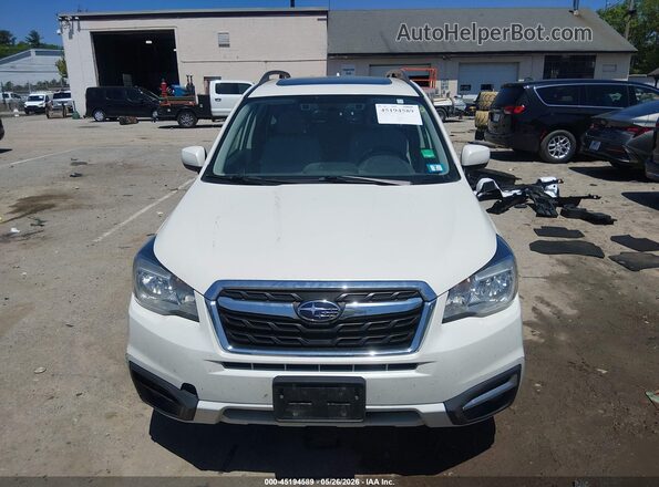 JF2SJAGC6JH417803 2018 SUBARU FORESTER White Vista interior trasera