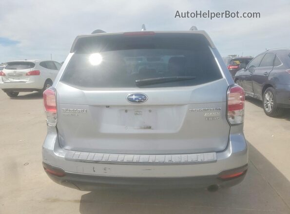 JF2SJAJC8HH412069 2017 SUBARU FORESTER Silver Vista trasera