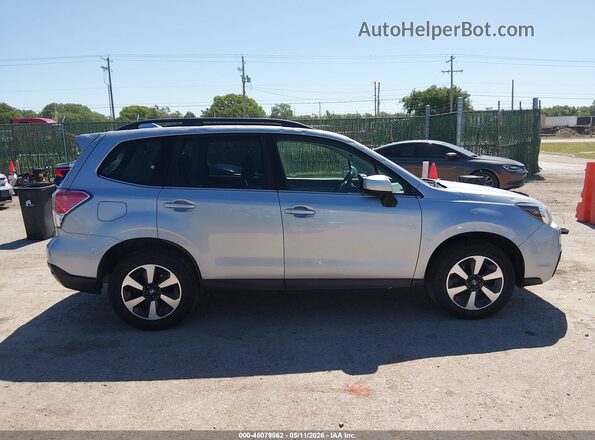 JF2SJARC3JH476028 2018 SUBARU FORESTER 2.5 Silver Vista interior trasera
