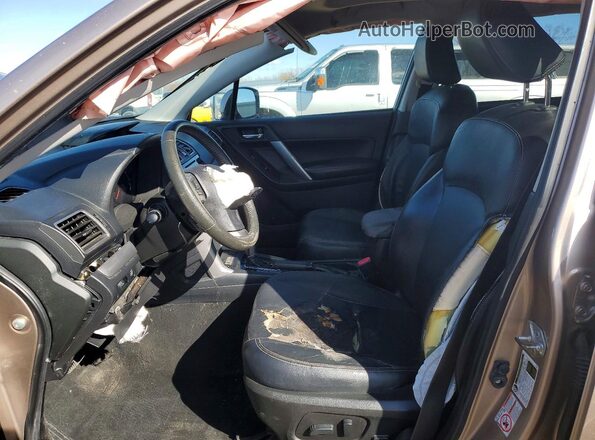 JF2SJAVC0GH458567 2016 SUBARU FORESTER Tan Front interior view