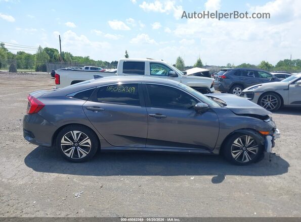 JHMFC1F83JX033604 2018 HONDA CIVIC Gray Vista interior trasera