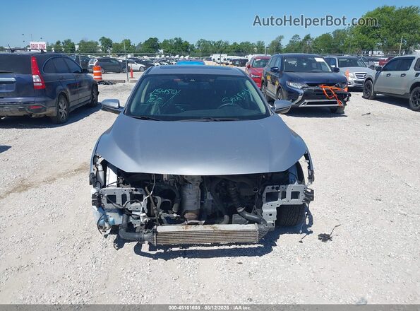JHMFC1F95JX030034 2018 HONDA CIVIC Silver Вид задньої частини салону