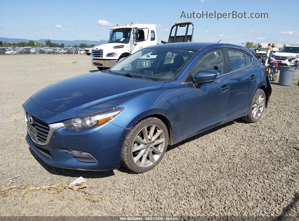 JM1BN1L77H1128640 2017 MAZDA 3 Blue Передня ліва чверть