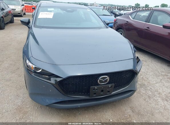 JM1BPBLL8T1868803 2026 MAZDA 3 Blue Սալոնի հետևի տեսք
