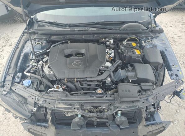 JM1BPBLM5R1658502 2024 MAZDA 3 Teal Vista interior trasera
