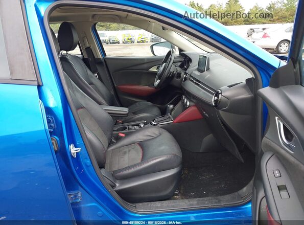 JM1DKBD73G0107133 2016 MAZDA CX-3 Blue Front interior view