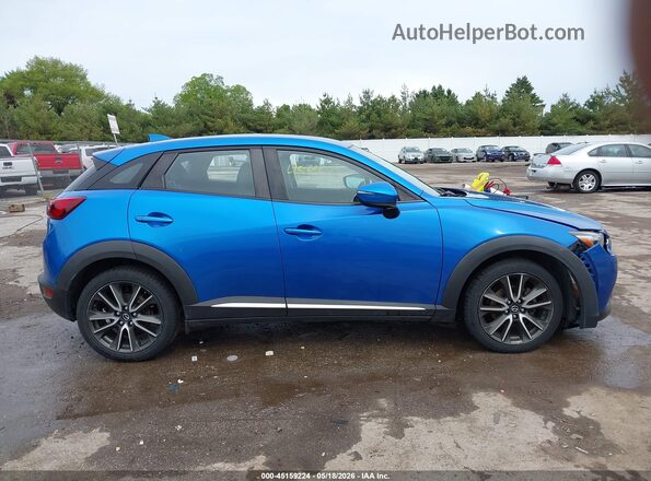 JM1DKBD73G0107133 2016 MAZDA CX-3 Blue Rear interior view