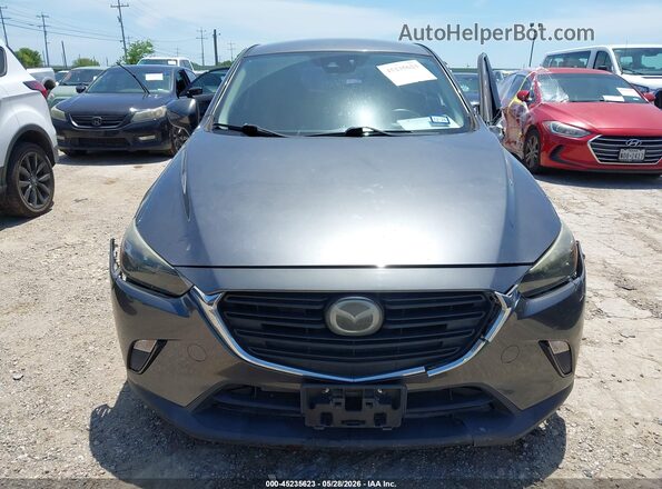 JM1DKDB73K1400287 2019 MAZDA CX-3 Gray Widok wnętrza z tyłu