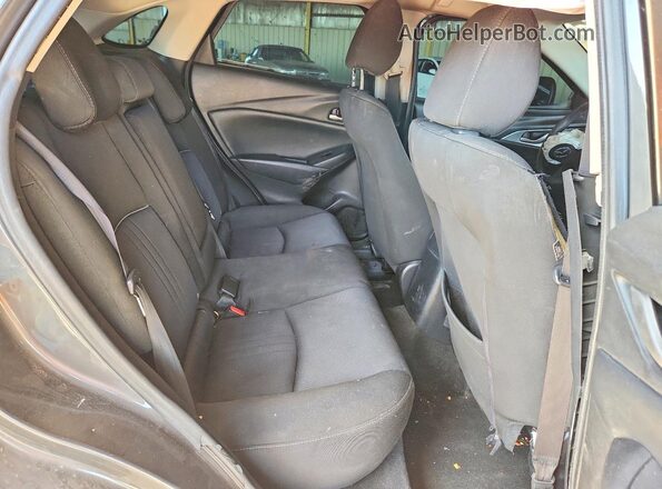 JM1DKDB74K0434065 2019 MAZDA CX-3 Gray Widok wnętrza z tyłu