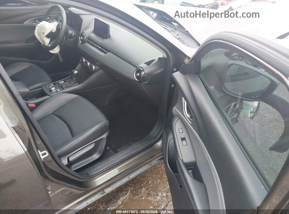 JM1DKDC72K0402570 2019 MAZDA CX-3 Gray Front interior view