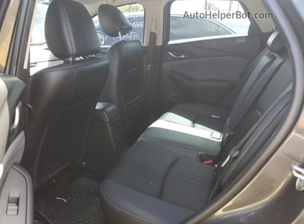 JM1DKDC7XK0412506 2019 MAZDA CX-3 Charcoal Rear interior view