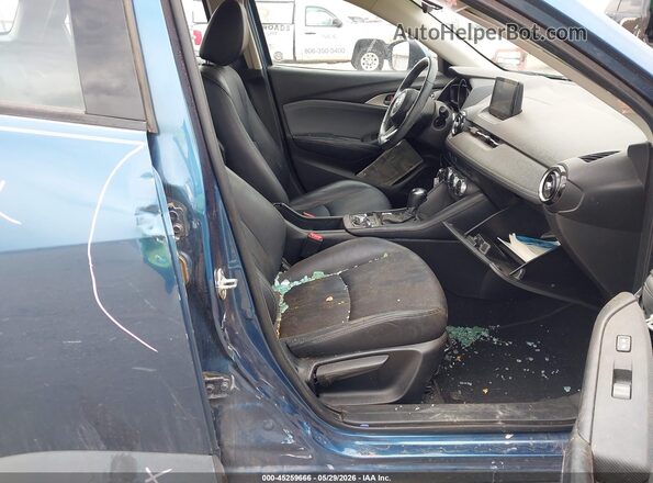 JM1DKFC78K0408465 2019 MAZDA CX-3 Синий Вид салона спереди