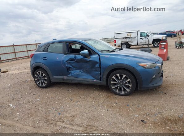 JM1DKFC78K0408465 2019 MAZDA CX-3 Синий Вид задней части салона