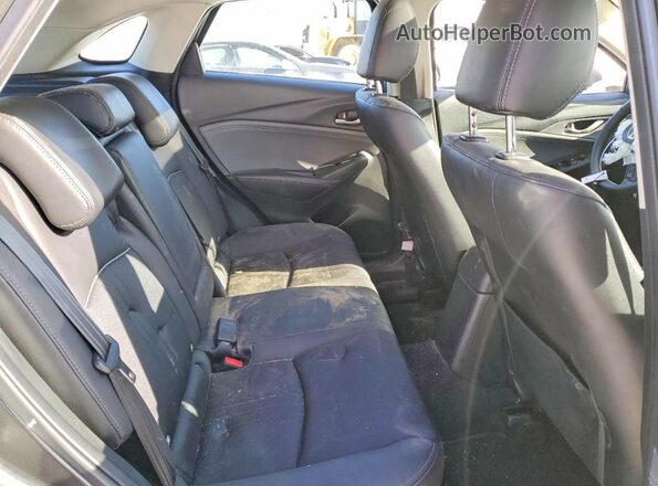 JM1DKFC79M1509740 2021 MAZDA CX-3 Gray Vista de los asientos traseros