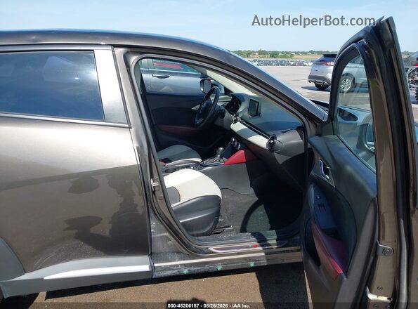 JM1DKFD70J0321849 2018 MAZDA CX-3 Gray Вид салону спереду