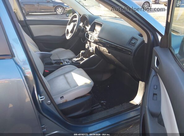 JM3KE2BY2G0741664 2016 MAZDA CX-5 Blue Вид салону спереду