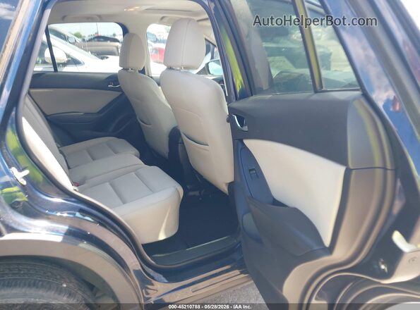 JM3KE2CY2G0764389 2016 MAZDA CX-5 Blue VIN კოდის სტიკერის ხედი
