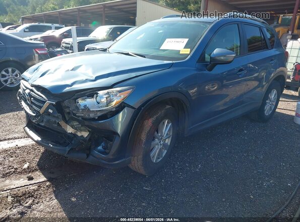 JM3KE2CY7G0916277 2016 MAZDA CX-5 Light Blue Առջևի ձախ երեք քառորդ տեսարան