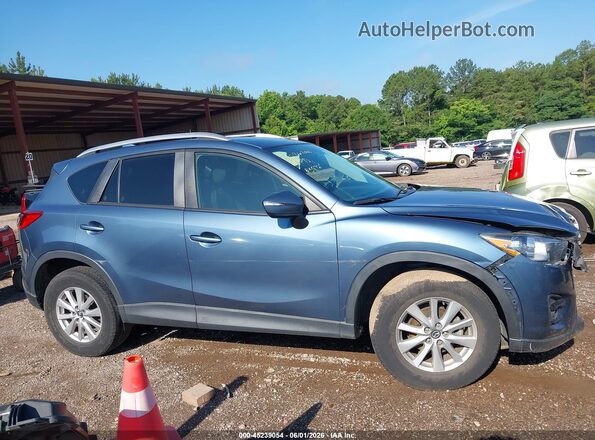 JM3KE2CY7G0916277 2016 MAZDA CX-5 Light Blue Սալոնի հետևի տեսք