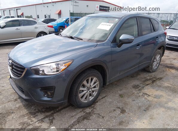 JM3KE2CY7G0919342 2016 MAZDA CX-5 Blue Front left