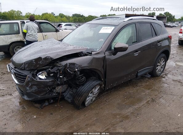 JM3KE2CY8G0916899 2016 MAZDA CX-5 Gray Առջևի ձախ երեք քառորդ տեսարան