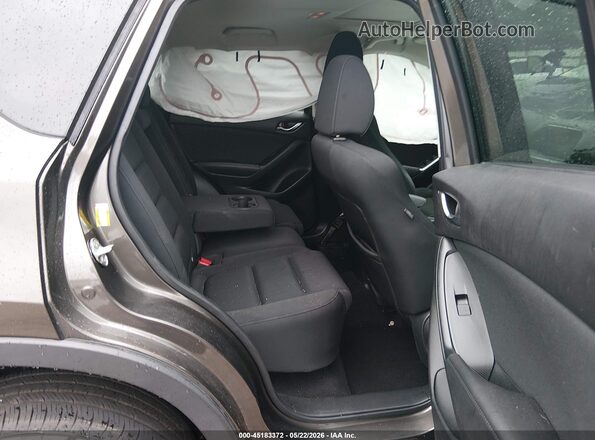 JM3KE2CY8G0916899 2016 MAZDA CX-5 Gray VIN կոդի պիտակի տեսք