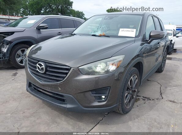 JM3KE2DY1G0811331 2016 MAZDA CX-5 Gray წინა მარცხენა ხედი სამი მეოთხედიდან