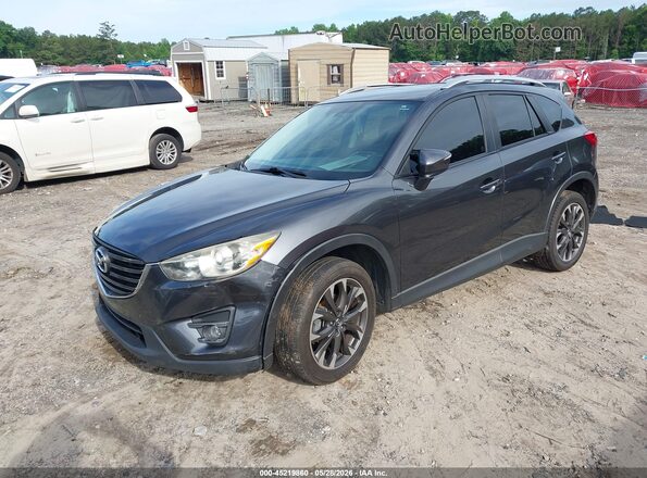 JM3KE2DY3G0643983 2016 MAZDA CX-5 Gray Vista tres cuartos delantera izquierda