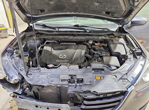 JM3KE4BYXG0631019 2016 MAZDA CX-5 Charcoal Vista del compartimento del motor